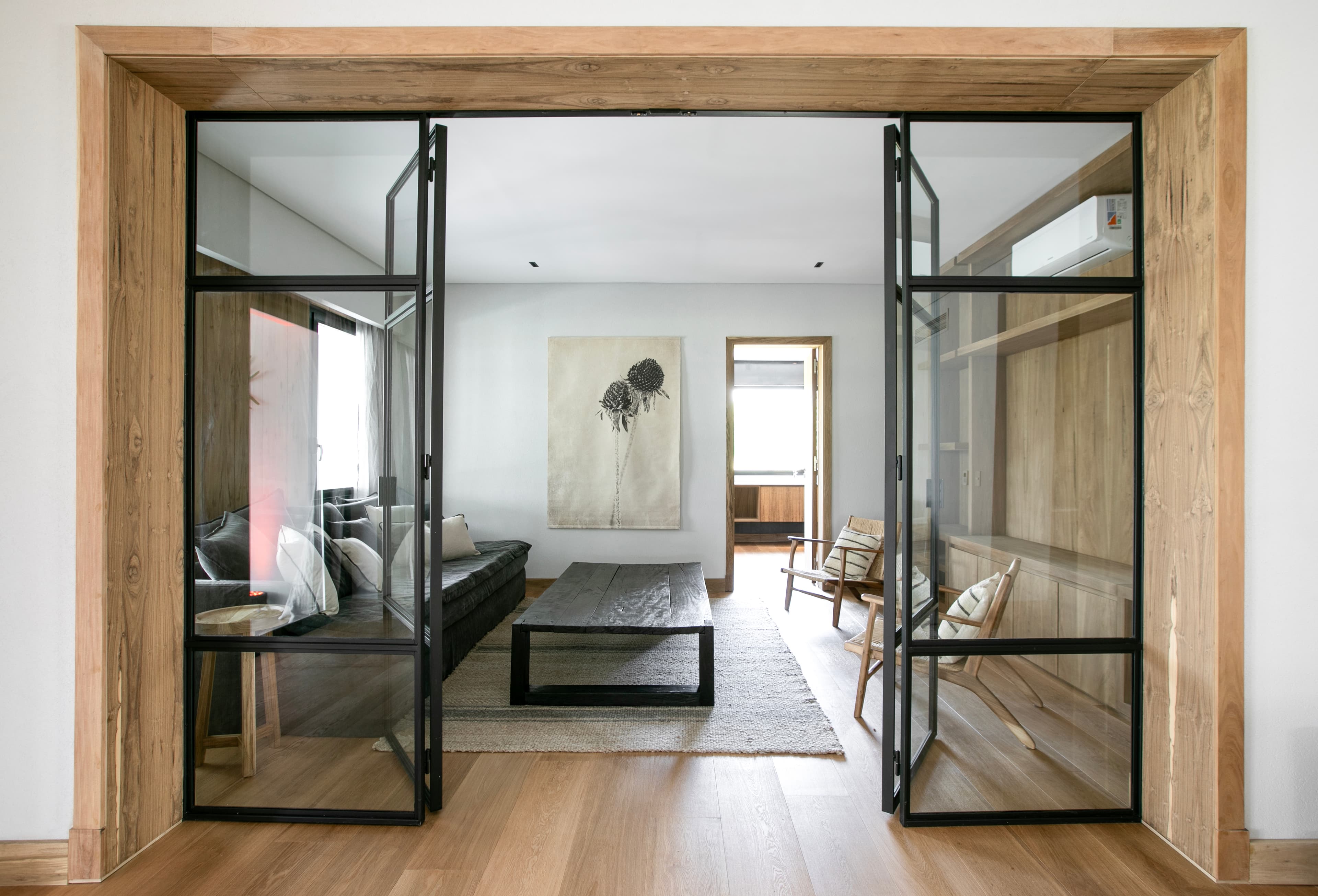 Modern interior design with minimalist furniture and concrete walls